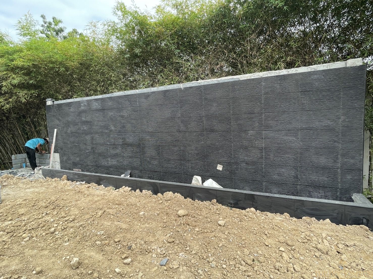 Tile wall work and sales office front steps including making stairs